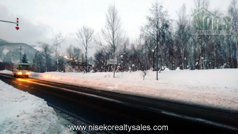 68m of road side frontage. Looking northwest with Niseko Grande Hirafu Ski Resort in the background.